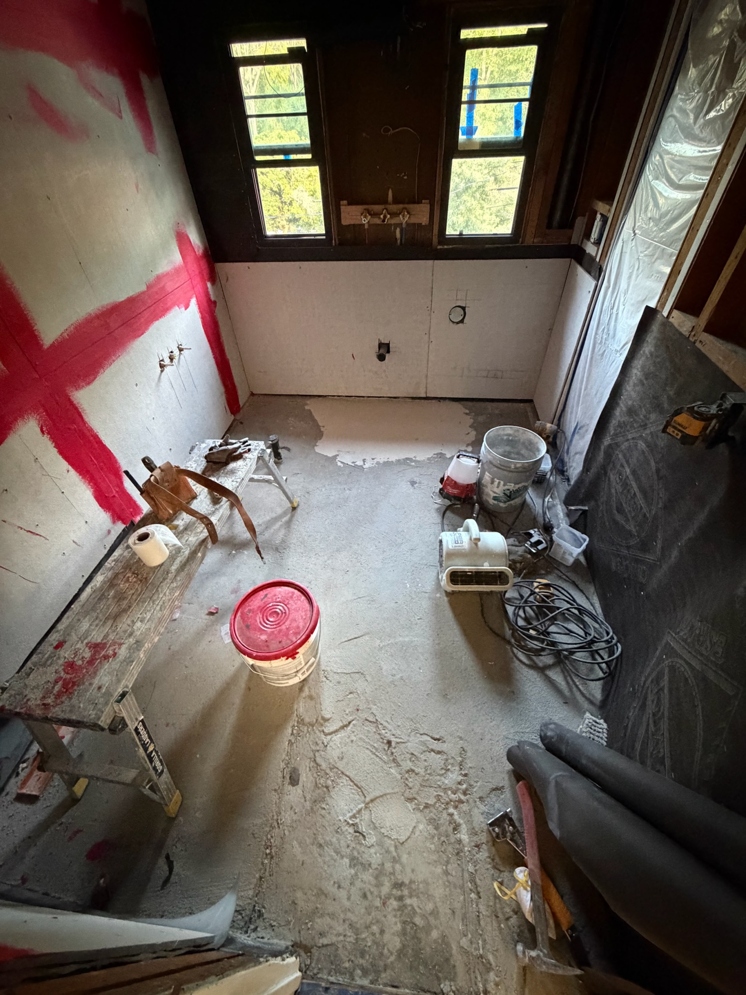 Bathroom walls and floor prepared for finish installation