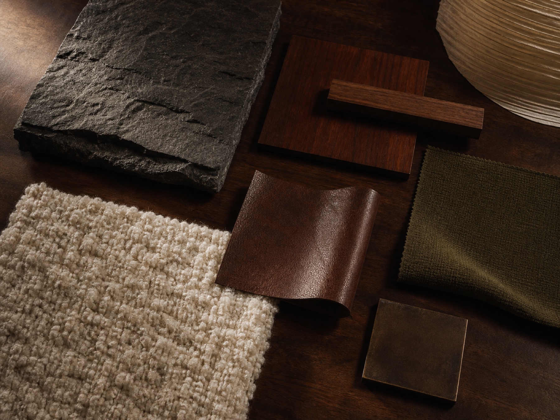 Dark walnut, charcoal stone, leather, wool, and olive textile material study matching Rendering 02